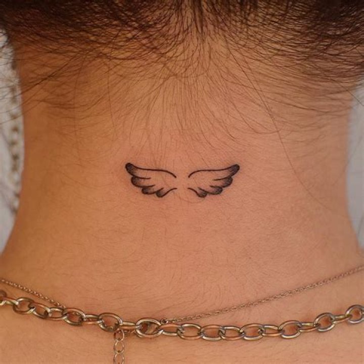 Exploring the Allure of Neck Wing Tattoos: A Comprehensive Guide